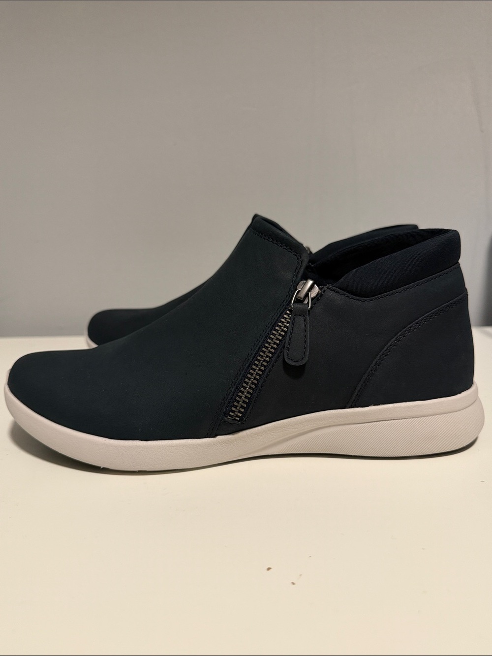 NAVY BLUE AETREX ZIP ANKLE BOOTS